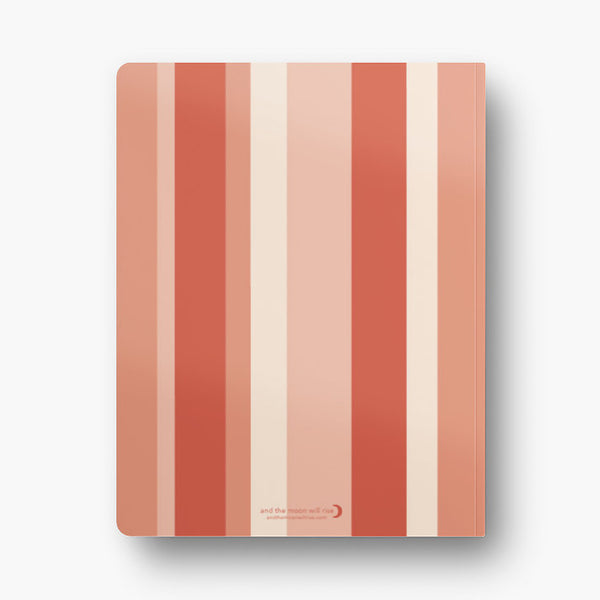 Back cover of dot grid 72-page notebook with soft touch cover; various width vertical stripes in shades of pink and coral