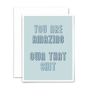 you are amazing own that sh!t blank greeting card; retro blue font on light blue background with white envelope