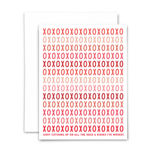 "XOXOXOXOXO Just catching up on all the hugs & kisses I've missed" greeting card; font in shades of reds and pinks on white background; blank interior with white envelope