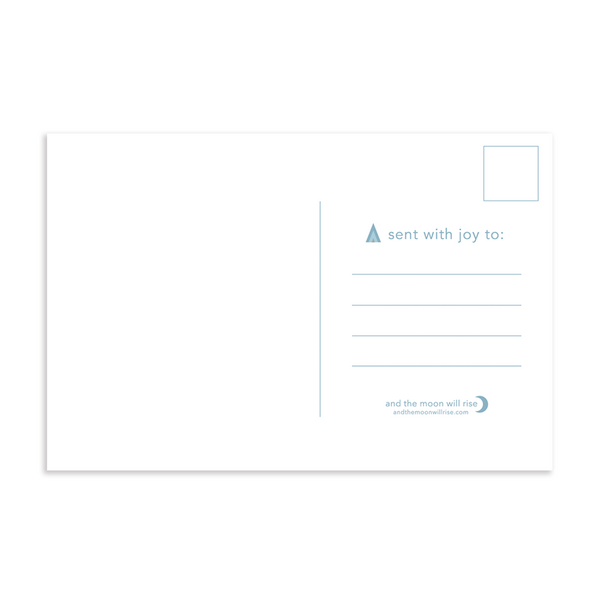 Back of fa la la la holiday postcard; blank left side for handwritten message; space for address and stamp on right; blue color