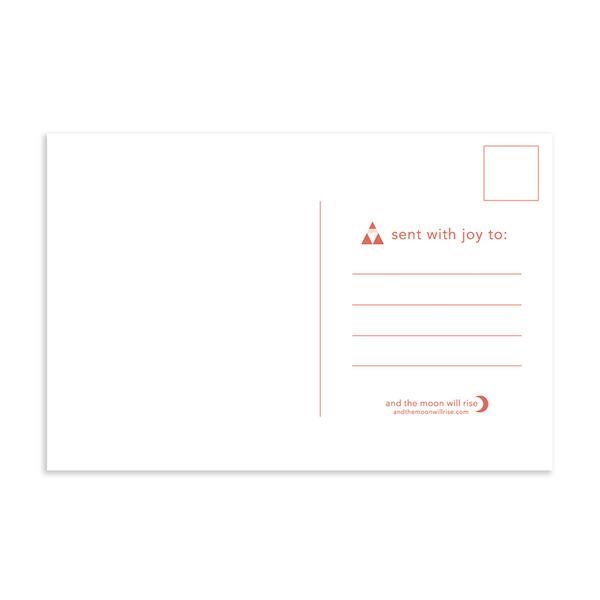 Back of Classic Christmas triangles holiday postcard; blank left side for handwritten message; space for address and stamp on right; coral color