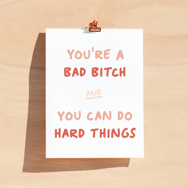Greeting card: 'You're a bad bish and you can do hard things' with blank interior; pink and coral text on white