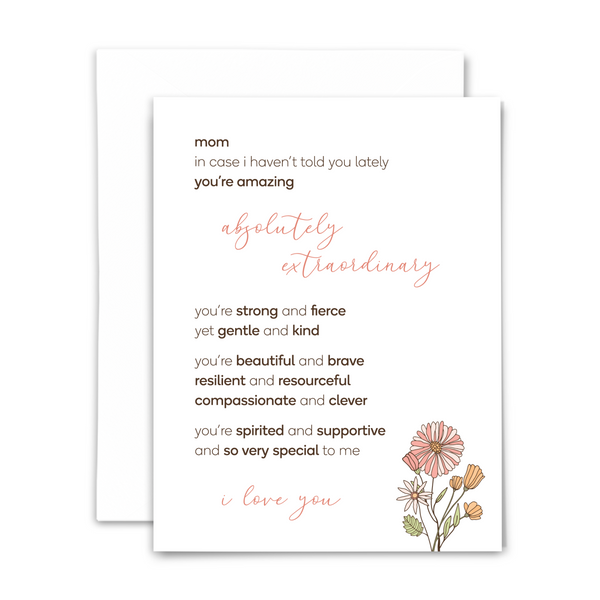 A white greeting card with a floral design and a message to a mom expressing love and admiration. The card is accompanied by a white envelope.
