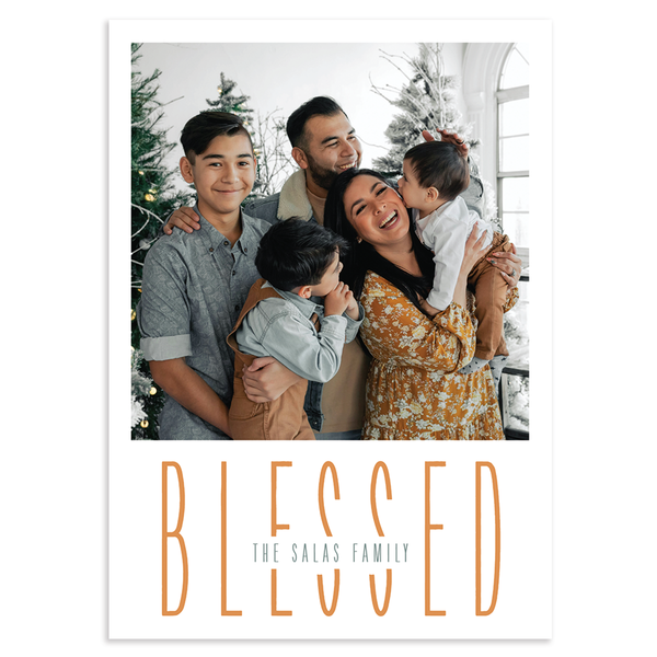 Custom holiday photo card with square image and 'BLESSED' text overlay on a white background