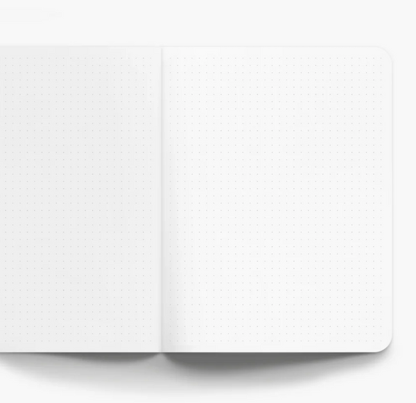Gray dot grid interior of notebooks on white paper