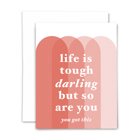 "life is tough darling but so are you; you've got this" greeting card; overlapping arches in shades of coral are backdrop for white serif font; blank interior and white envelope