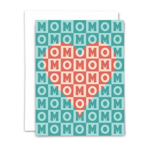 Greeting card and white envelope with checkered background in shades of teal spell out mom with coral and blush heart in the middle