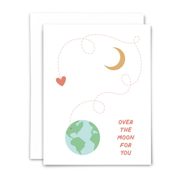 Greeting card with a curly cue dashed line connecting Earth over a crescent moon to a heart with text 'OVER THE MOON FOR YOU' on a white background