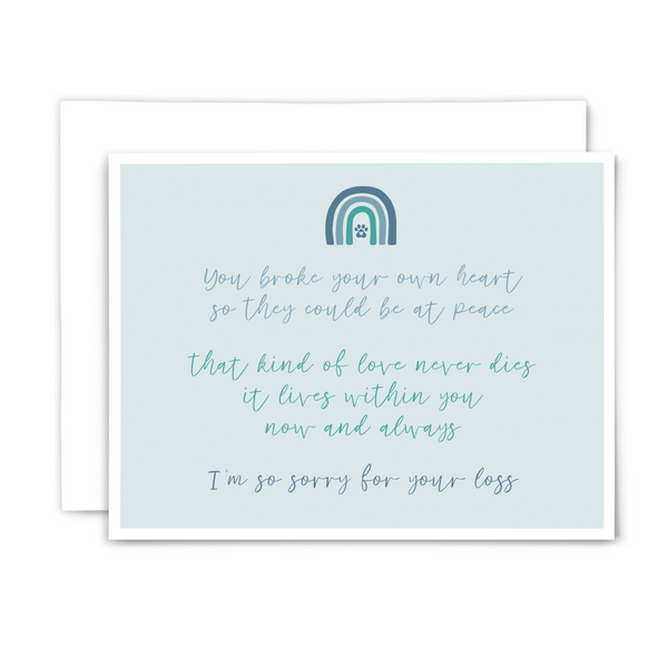 Pet loss horizontal A2 sympathy card with text "you broke your own heart so they could be at peace; that kind of love never dies it lives within you now and always; I'm so sorry for your loss" in script font with white envelope on white background