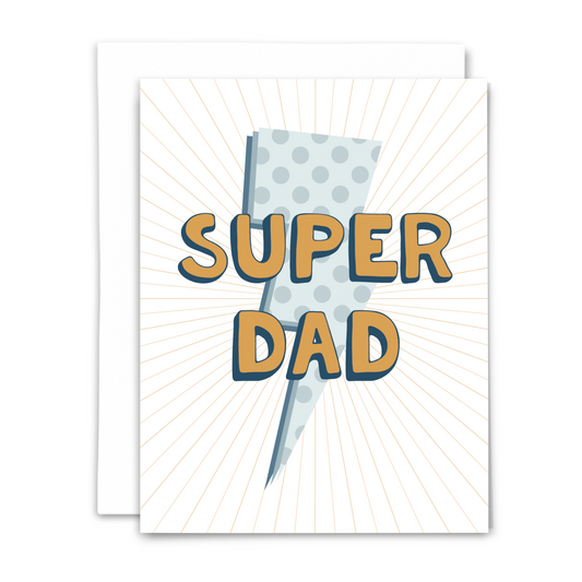 Super dad ever greeting card with blank interior; blue lightning bolt with polka dots atop gold lines radiating out from center with large navy and gold bubble text 'SUPER DAD' with white envelope