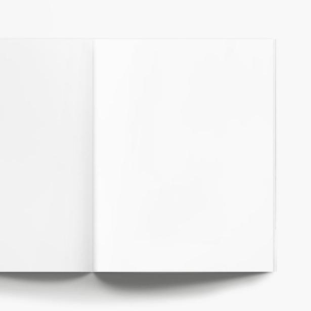 Unlined grid interior of notebooks on white paper