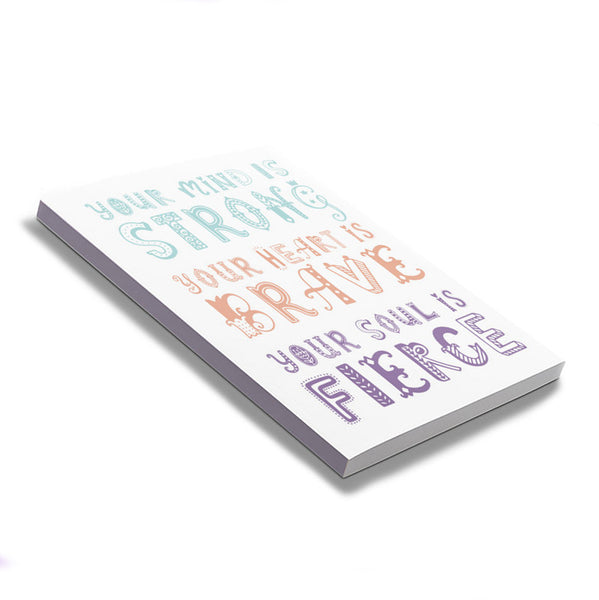 Front cover of unlined 72-page notebook with soft touch cover; "your mind is strong your heart is brave your soul is fierce" in pink, purple and mint decorative font atop white background