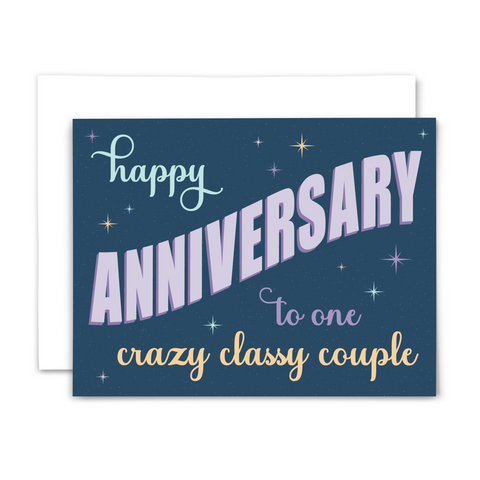 Retro-style anniversary greeting card "happy anniversary to one crazy classy couple" in blue, purple and yellow fonts on dark blue background with colorful stars and light blue dots; with white envelope