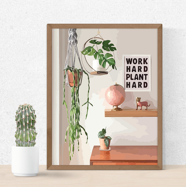 Chic and charming illustration based on a fan-favorite @workhardplanthard vignette. Features her Rhipsalis paradoxa, Raphidophora tetrasperma and Scindapsus pictus 'exotica'. Shown framed and perched on a tabletop next to a cactus