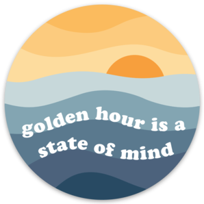 Golden Hour is a State of Mind vinyl sticker; sunset over blue waves; 3" round