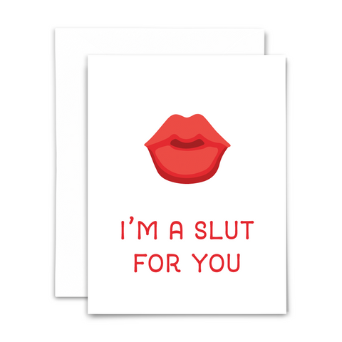 "I'm a slut for you" in red lettering with red and pink cartoon lips on white background; blank interior with white envelope
