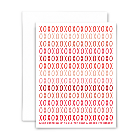 "XOXOXOXOXO Just catching up on all the hugs & kisses I've missed" greeting card; font in shades of reds and pinks on white background; blank interior with white envelope