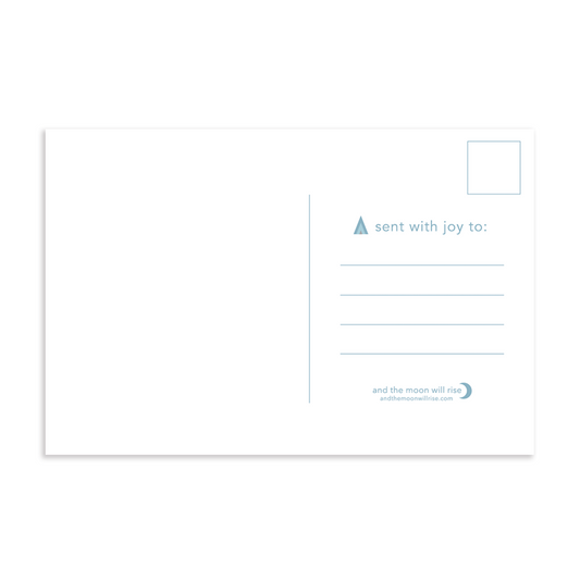 Back of fa la la la holiday postcard; blank left side for handwritten message; space for address and stamp on right; blue color