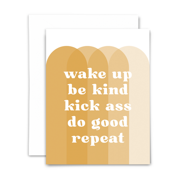 Inspirational blank greeting card "wake up be kind kick ass do good repeat" white font on backdrop of repeated golden arches; with white envelope