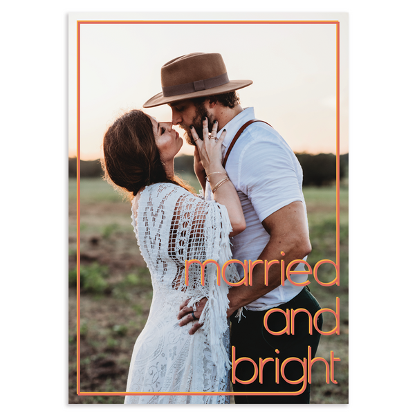Married and bright holiday photo card; 7" x 5" vertical orientation; single photo on front; fully customizable back; double coral and gold sans serif font and border