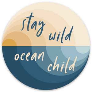 Stay wild ocean child vinyl sticker; concentric semi-circles in blue and gold hues create the illusion of a beach wave with a sunset above; handwritten font