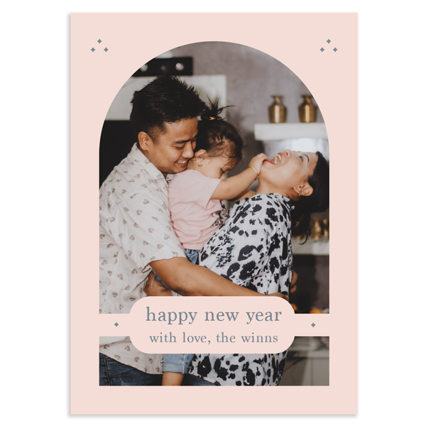 Happy new year photo card; 7" x 5" vertical orientation; single arch with banner in blush pink; fully customizable back