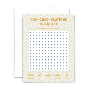 Graduation word search greeting card "con-grad-ulations you did it!" in gold font on pale yellow background with mint green confetti; 25-word word search with answers on back and blank interior; with white envelope