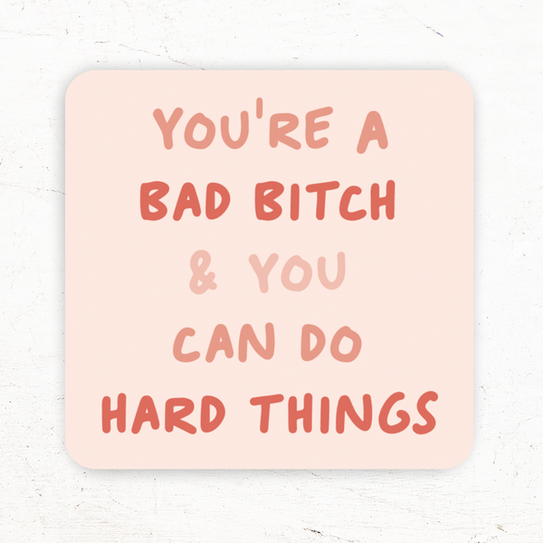 3x3" vinyl magnet with rounded corners; pink handwritten font on light pink background: "You're a bad bitch and you can do hard things" shown on marble background